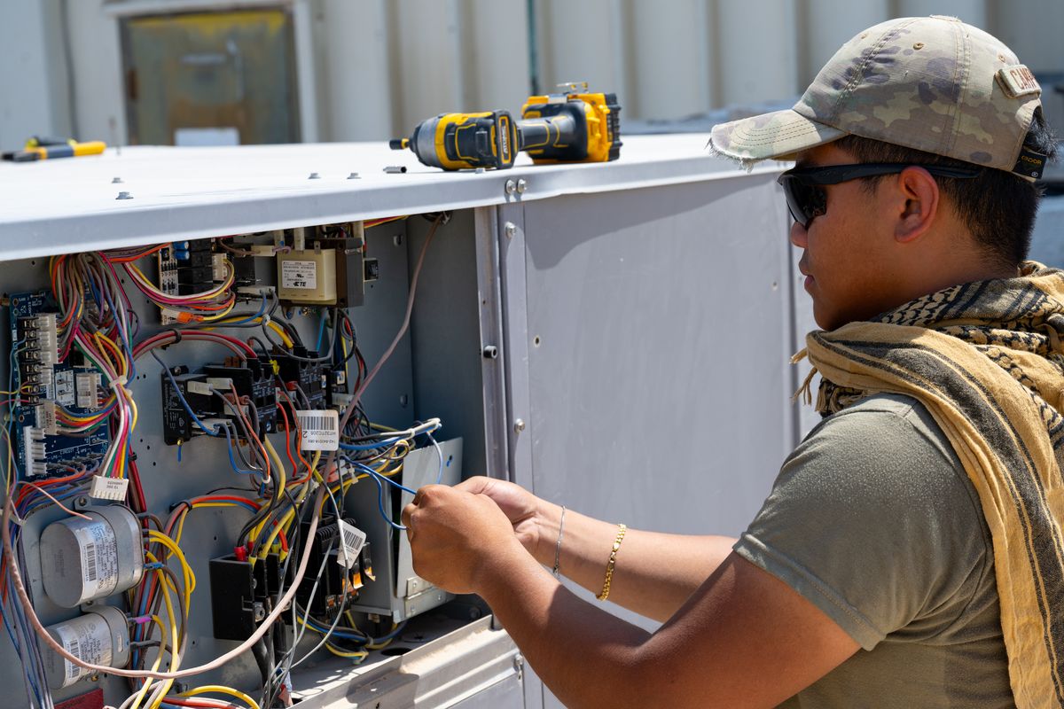 Photo 1 — Annual air-conditioning maintenance contract