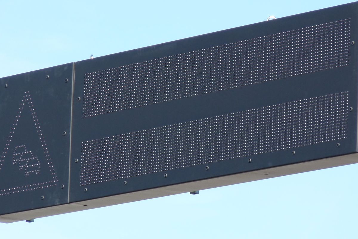 Photo 1 — Illuminated signs and wayfinding